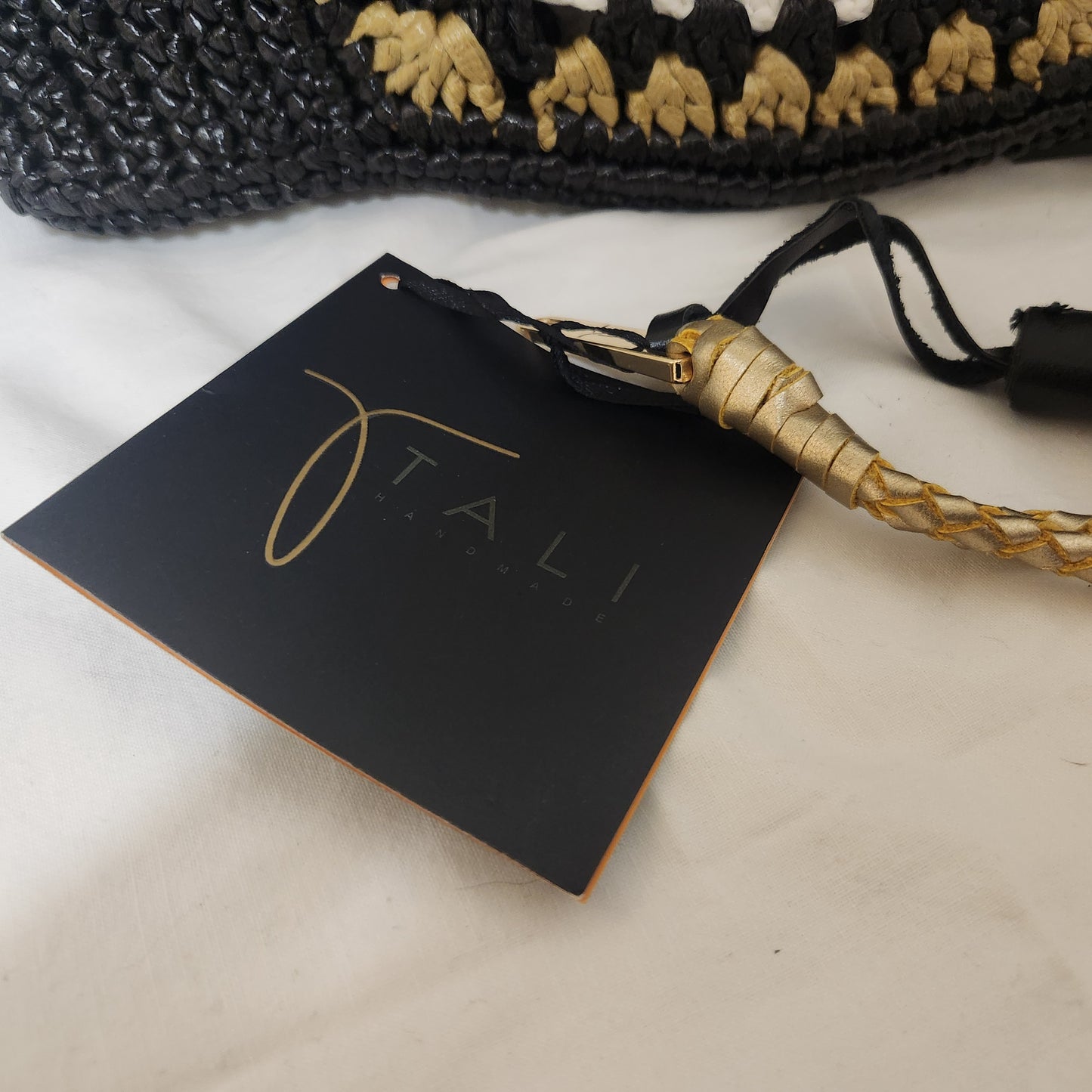 TALI Handmade Woven Clutch | Black, White & Gold Artisan Zip Pouch with Leather Tassel