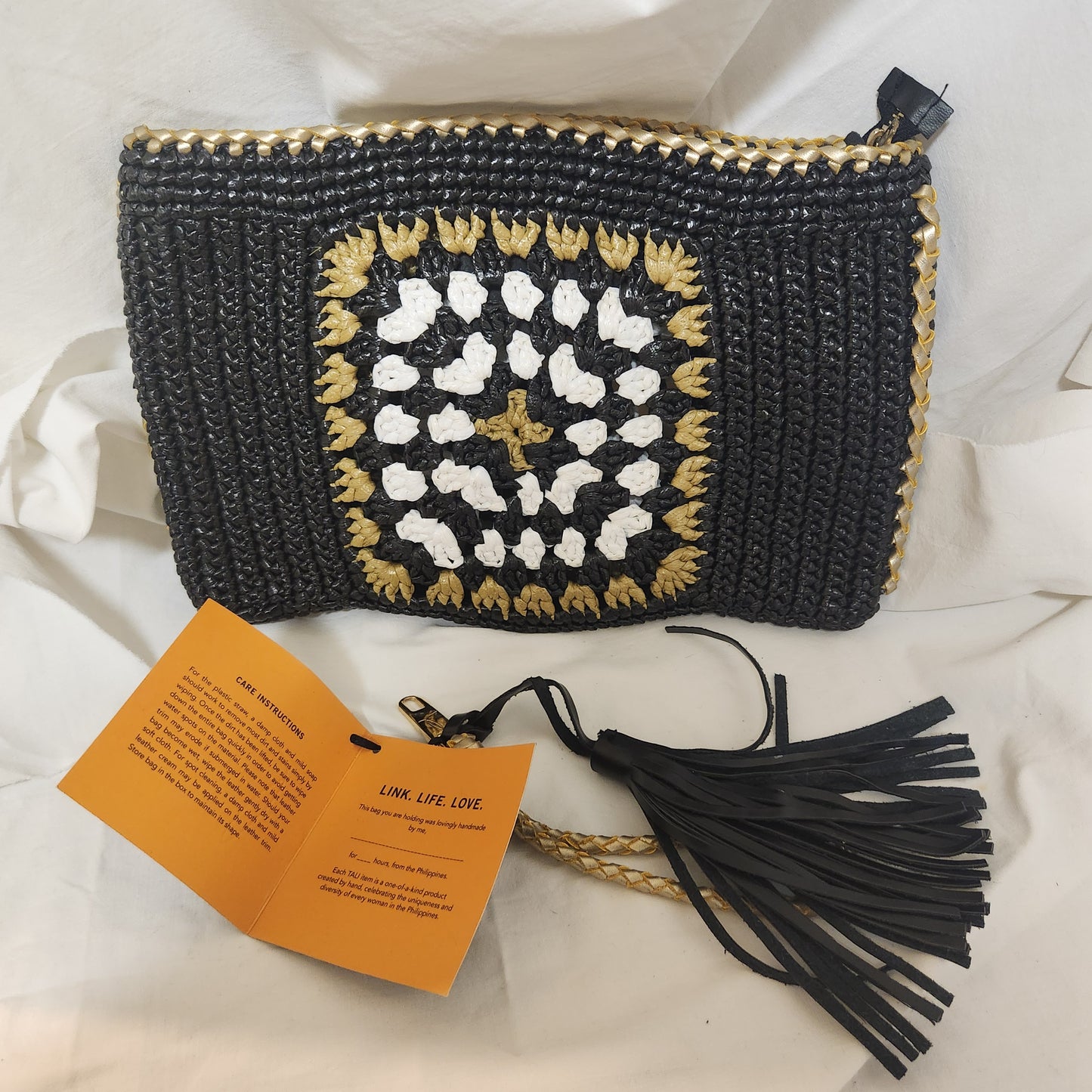 TALI Handmade Woven Clutch | Black, White & Gold Artisan Zip Pouch with Leather Tassel