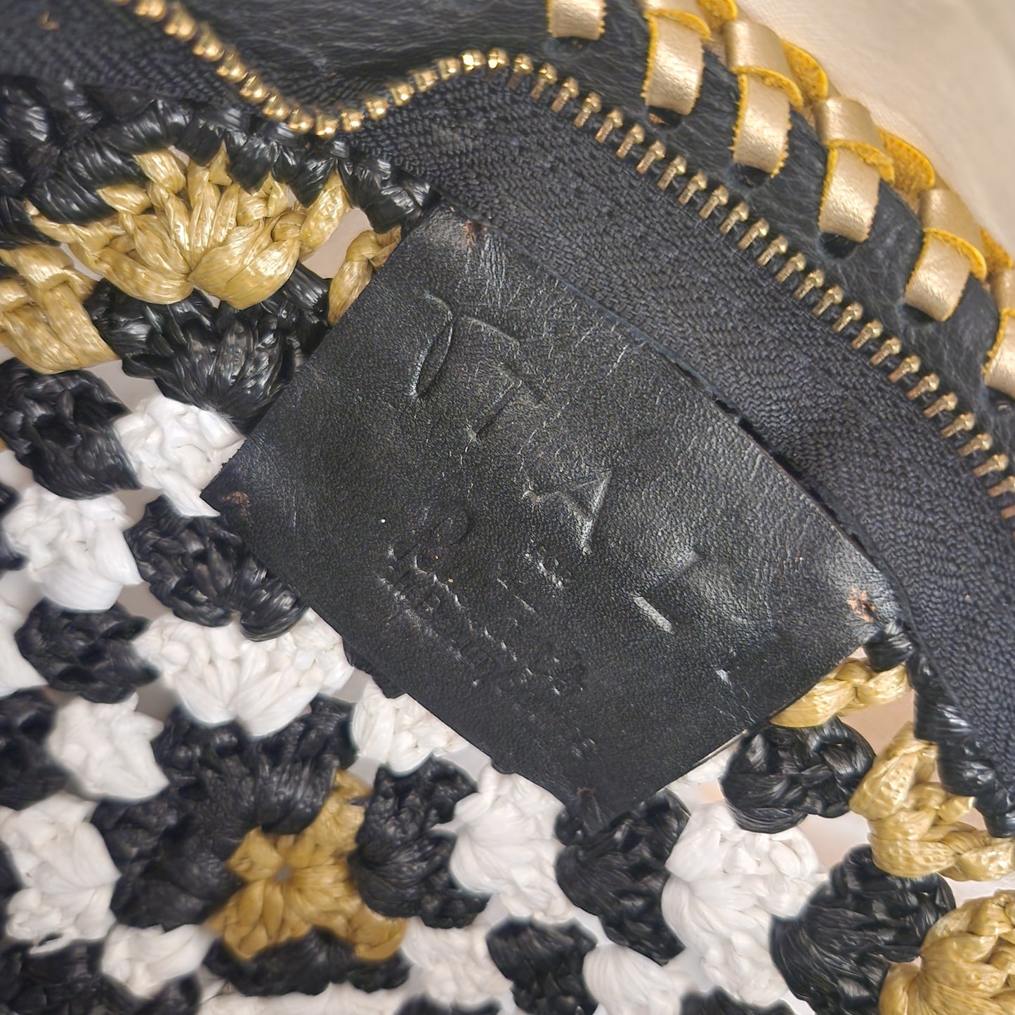 TALI Handmade Woven Clutch | Black, White & Gold Artisan Zip Pouch with Leather Tassel